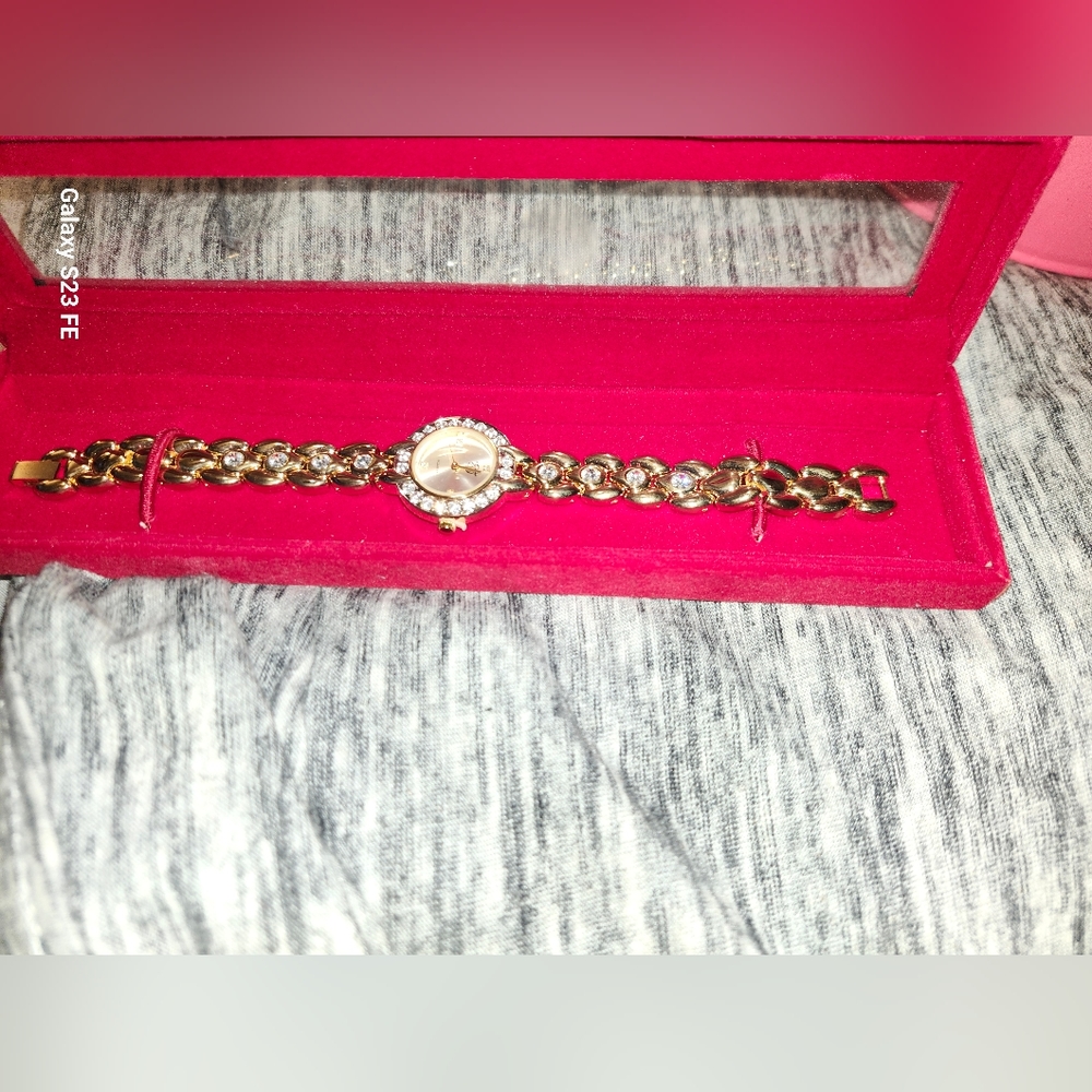 Gold tone watch still in box